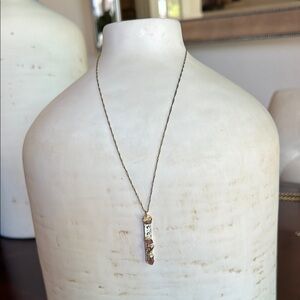 Elegant Gold and Silver Pendant Necklace